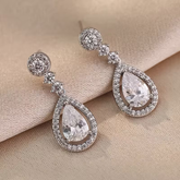 Elegant Crystal Teardrop Earrings – Silver Halo Drop Design