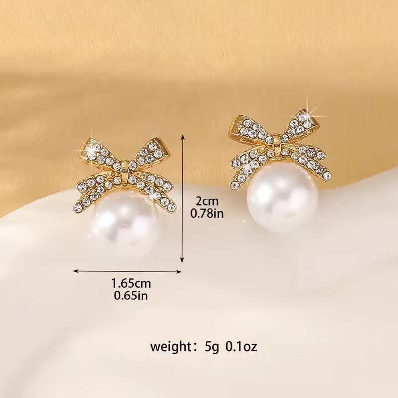 Pink Pearl Bow Stud Earrings – Gold Tone