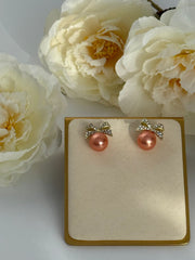 Pink Pearl Bow Stud Earrings – Gold Tone