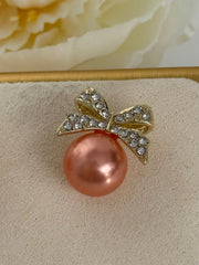 Pink Pearl Bow Stud Earrings – Gold Tone
