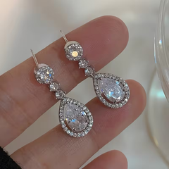 Elegant Crystal Teardrop Earrings – Silver Halo Drop Design