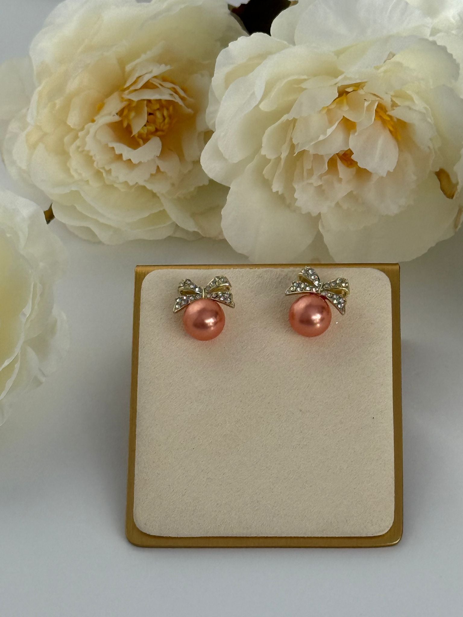 Pink Pearl Bow Stud Earrings – Gold Tone