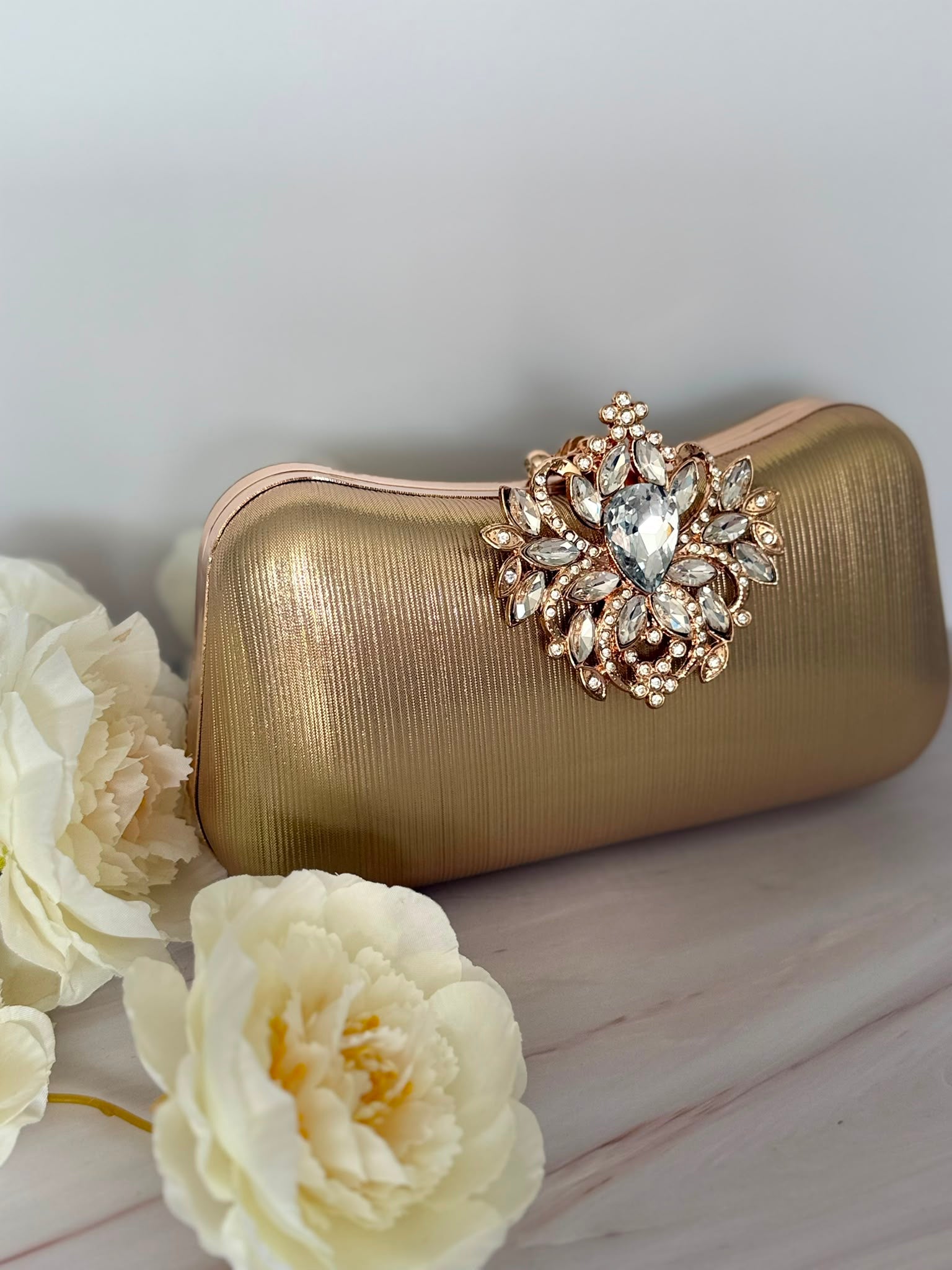 Golden Handbag with Crystal Clasp