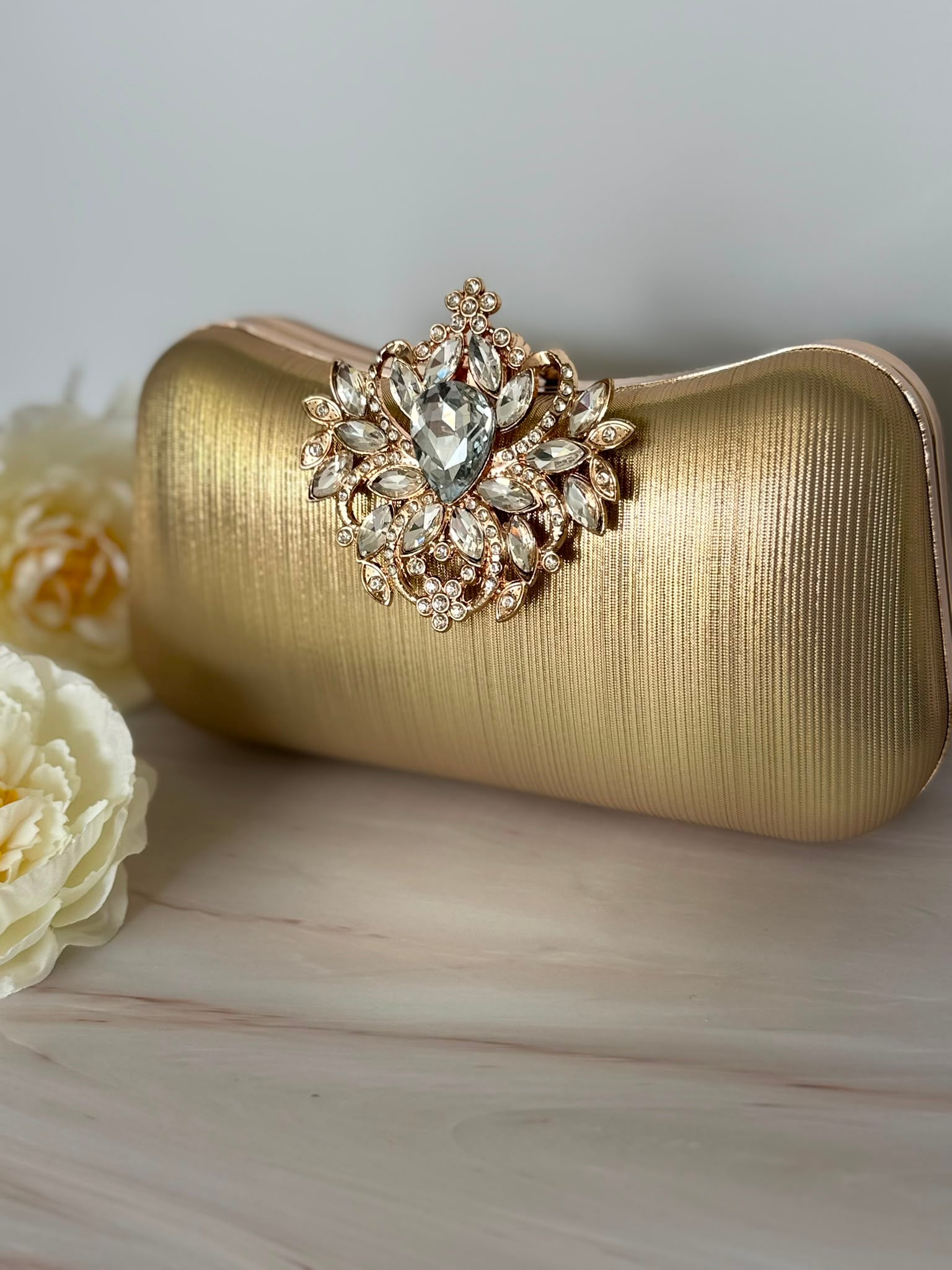 Golden Handbag with Crystal Clasp